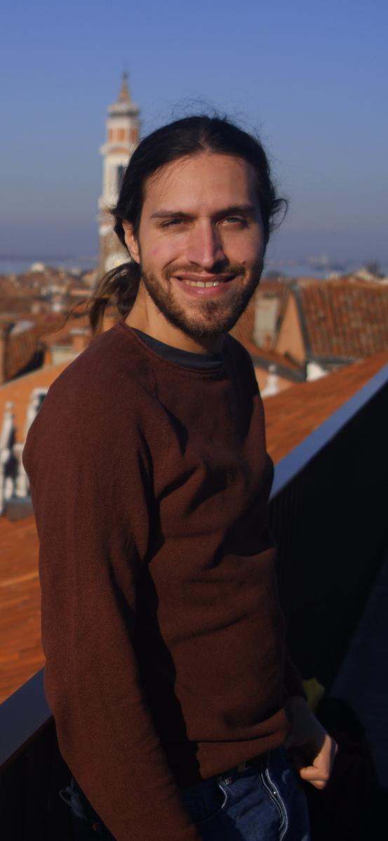 A photo of me taken at the Fondaco dei Tedeschi rooftop in Venice, Italy